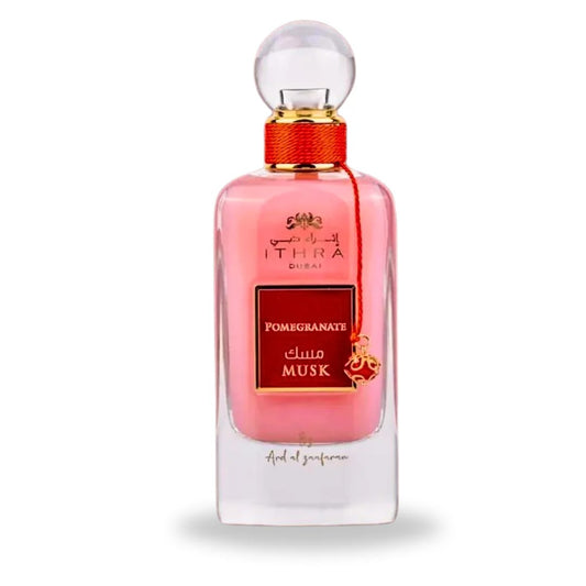 Perfume bottle with pink label on a white background